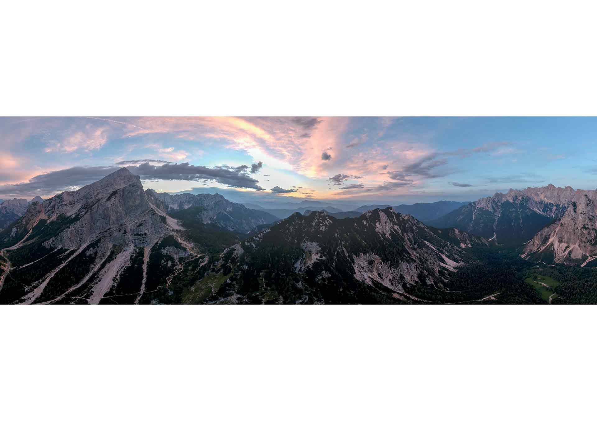 Colourful clouds sunset of the Julian Alps.